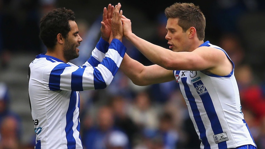 Daniel Wells and Ryan Bastinac celebrate a goal