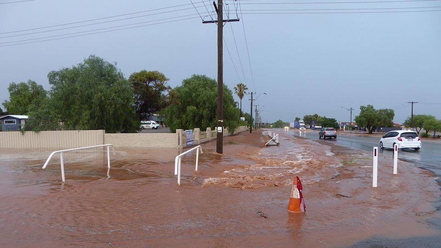 A street left flooded by rain in Coolgardie, Western Australia