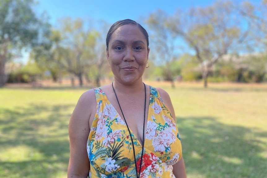 woman smiles at camera 