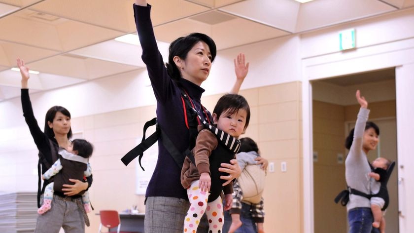 Japanese mothers with their babies in a dance class