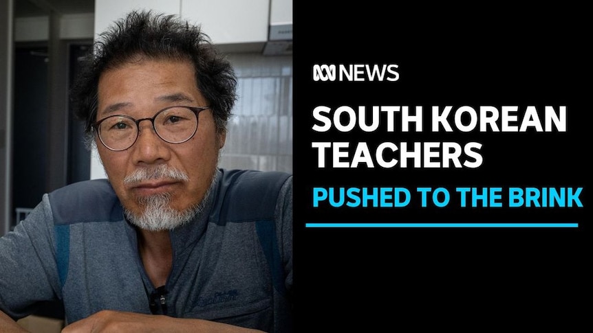 South Korean Teachers, Pushed to the Brink: A man with glasses looks at the camera with a morose expression.