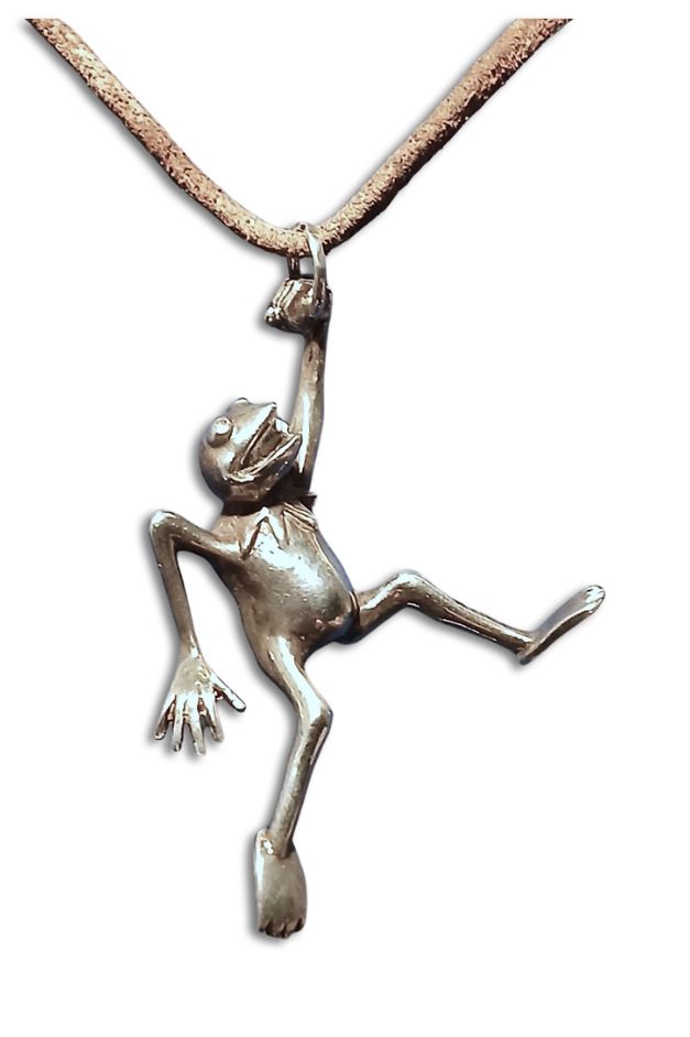 a silver kermit dangles from a chain