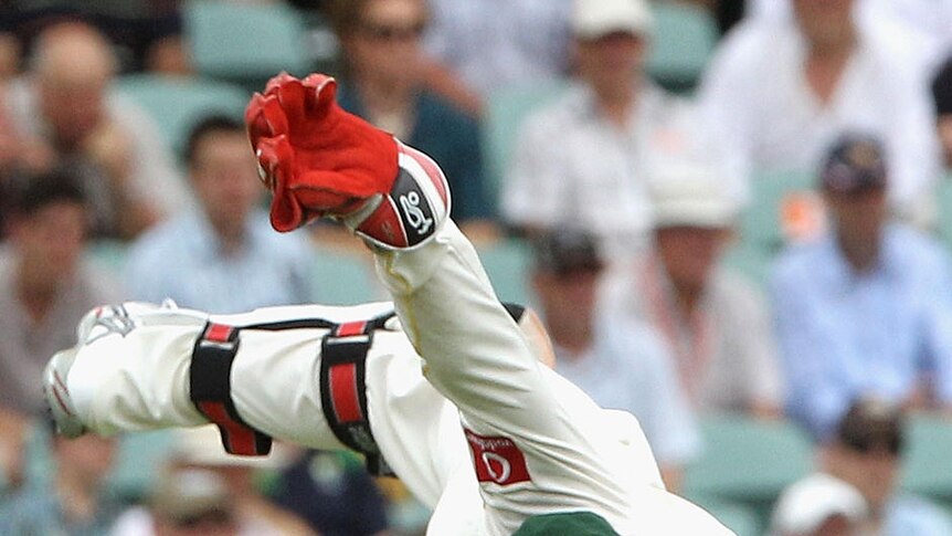 What a catch ... Brad Haddin gloved a screamer to send Alastair Cook packing early.