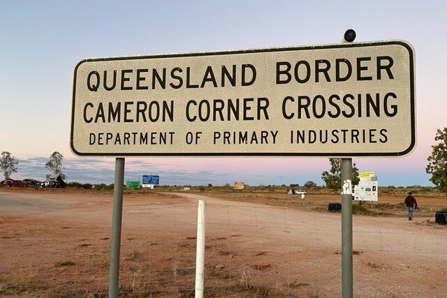Border sign at Cameron Corner in outback Queensland from SA.