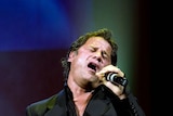 Jon Stevens performs