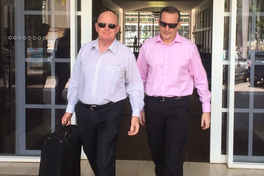 Paul Mossman and his lawyer Tom Berkley walk out of the Darwin Supreme Court