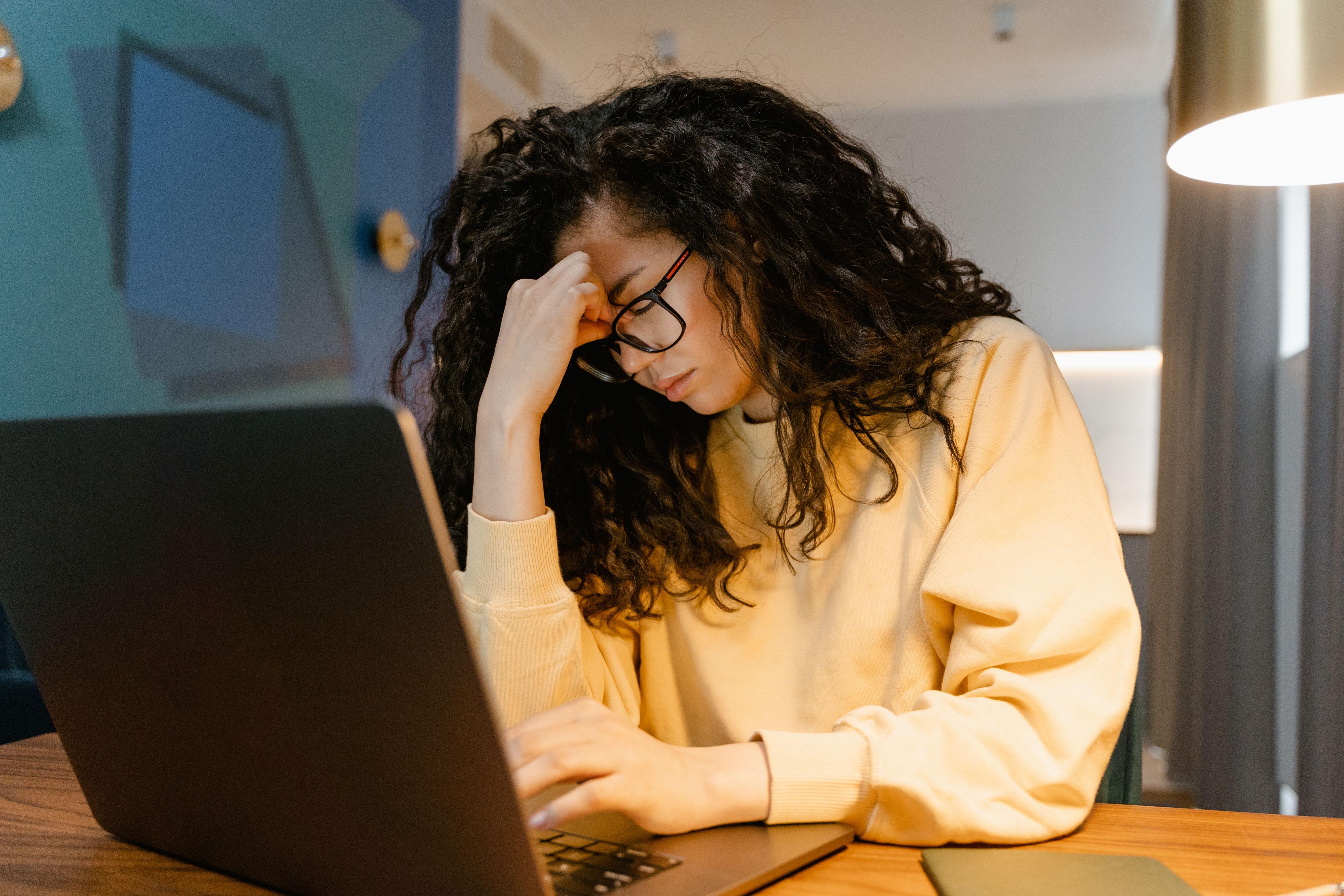woman stressed at her computer