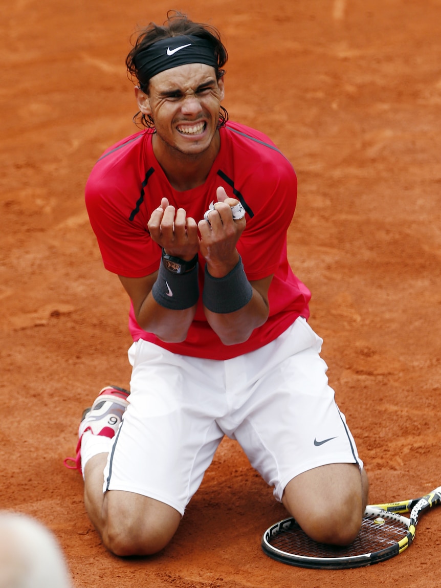 Seventh heaven ... Nadal revels in an anti-climactic but record-breaking winning match point.