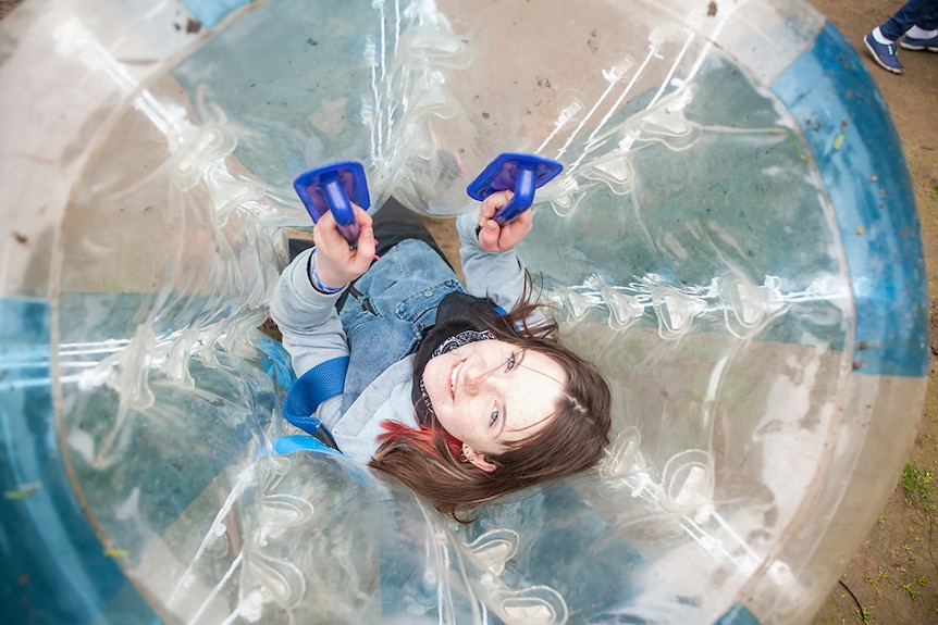 Girl in inflatable ball