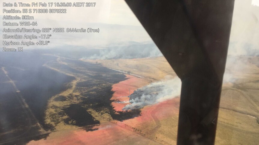 Aerial shot of the Carwoola fire from within a cockpit.