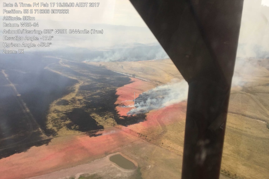 Aerial shot of the Carwoola fire from within a cockpit.