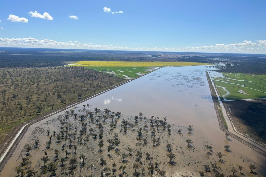 Aerial view of floodwater covering farmland