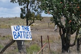 "Up the Battlers" sign on a fence near Taroom, Queensland November 2021.