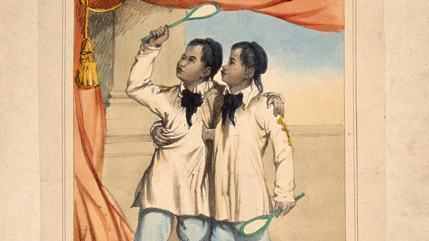 Chang and Eng the Siamese twins, aged eighteen, playing badminton