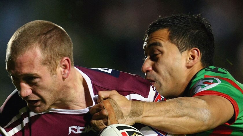 Michael Monaghan tries to make a break for the Sea Eagles