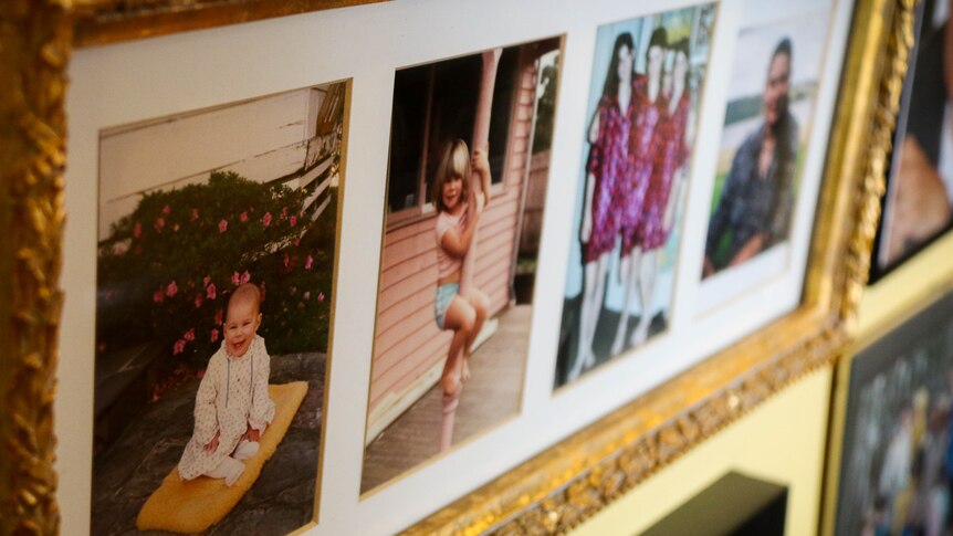 Photos of the Foster girls in a gold frame, showing them at different ages.