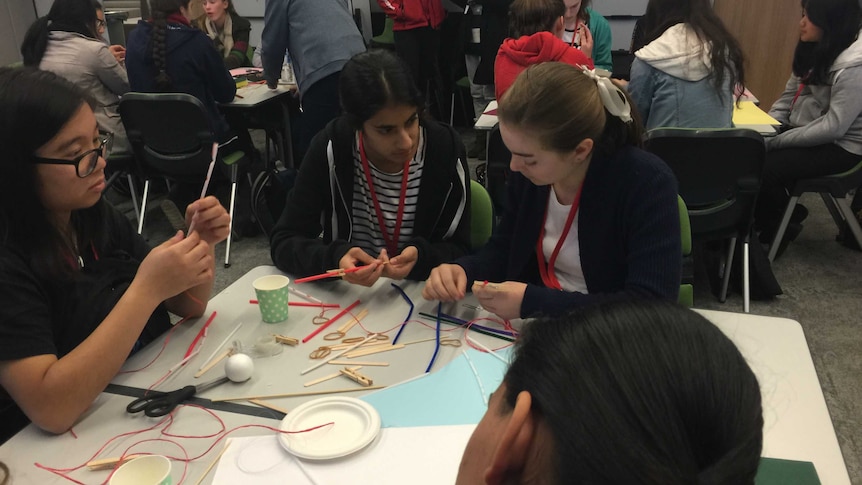 High school girls working at Power of Engineering Day