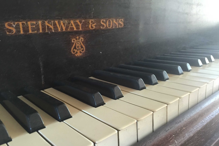 A close up of the Steinway & Sons piano, which cost in the order of $80,000 new and $20,000 second hand.