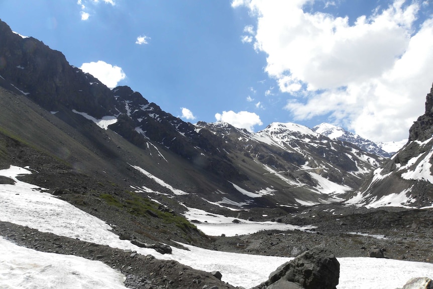 Mountains partially covered in snow in Chile