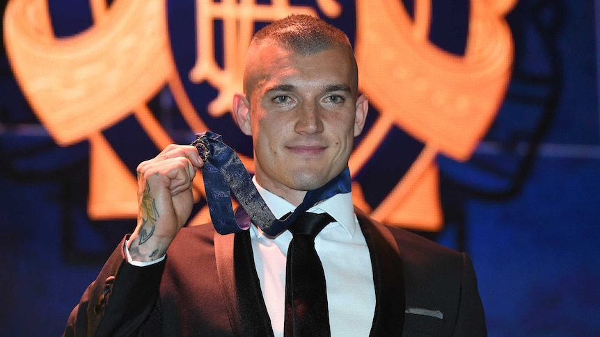 Dustin Martin poses with his 2017 Brownlow Medal.