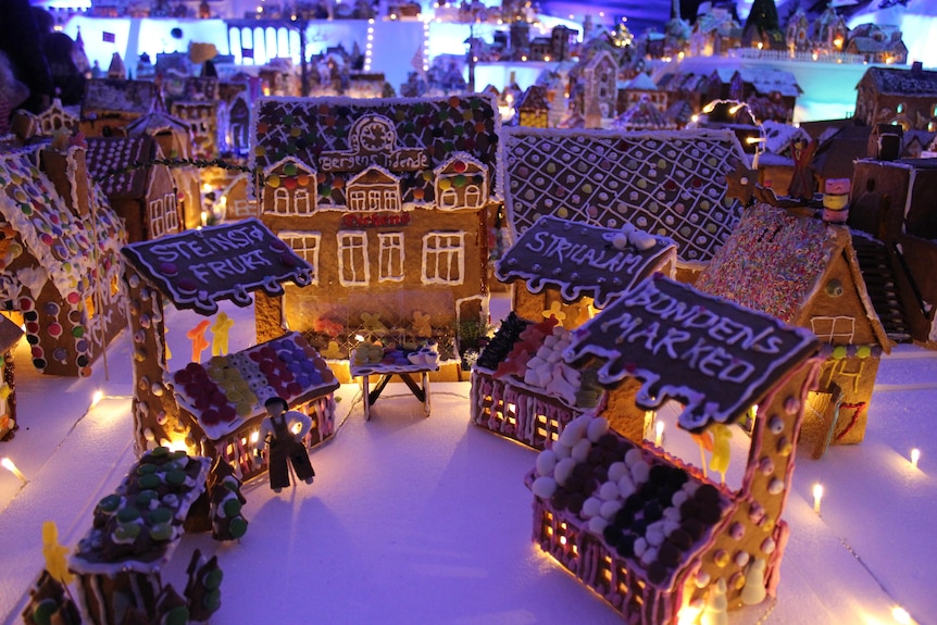A model market made from gingerbread and decorated with sweets and icing.