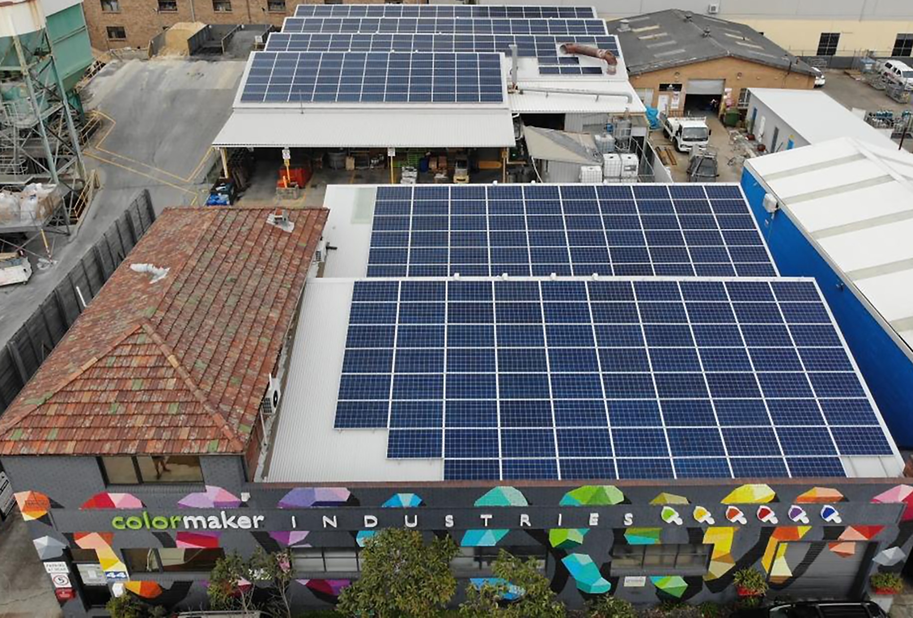 Solar panels on a commercial building's rooftop.