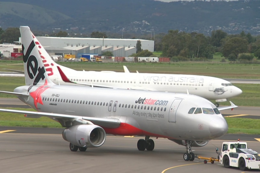 Two large planes on the tarmac