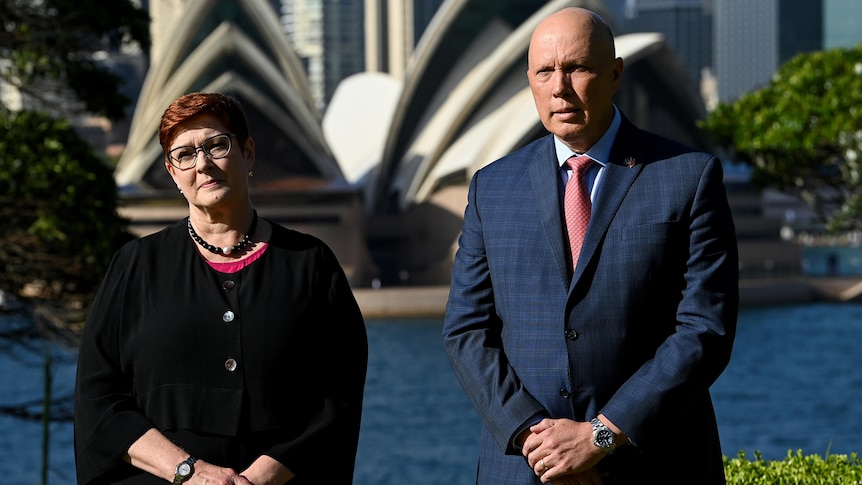 Australian Foreign Minister Marise Payne and Australian Defence Minister Peter Dutton standing together.