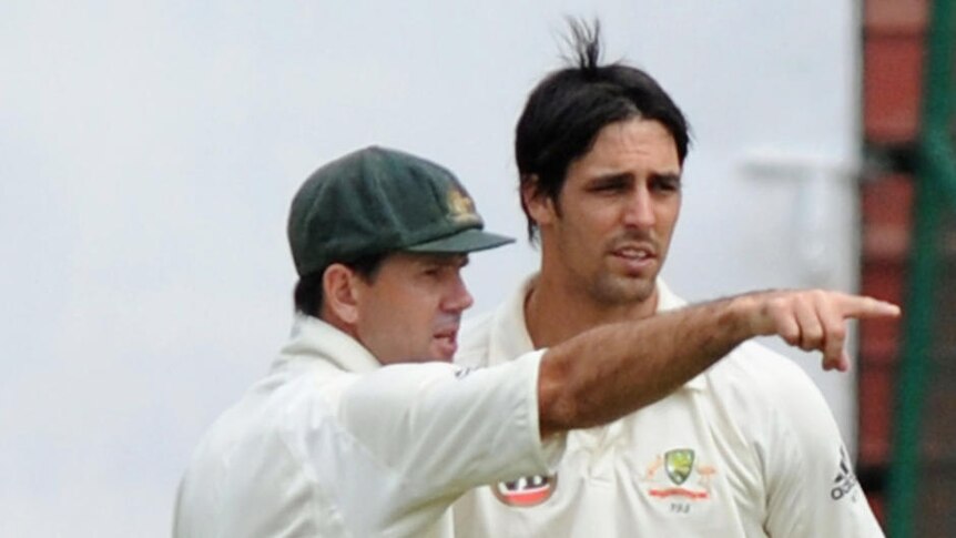 Time to go? Ricky Ponting discusses field placings with Mitchell Johnson on the final day of the second Test