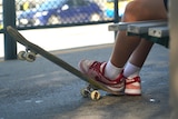 Kids shoes on skateboard