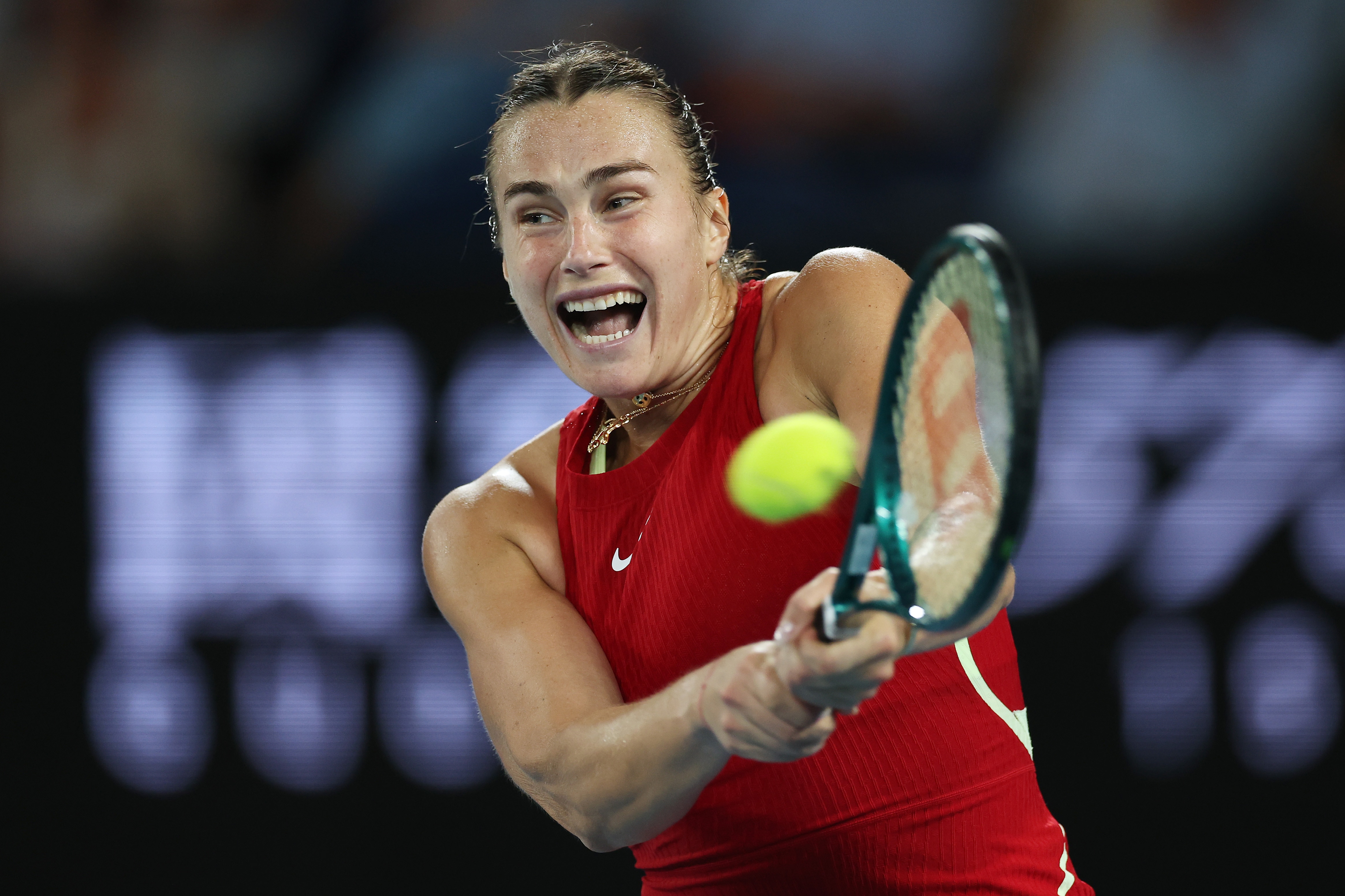 Aryna Sabalenka plays a backhand return at the 2024 Australian Open.