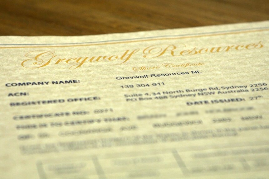 A piece of paper with the words "Greywolf Resources, Share Certificate" and details of the company, date issued, etc.