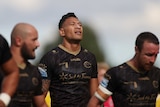 Rugby league player Israel Folau looks tired during a match