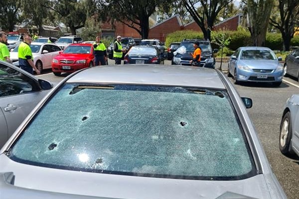 A car with holes in its back window