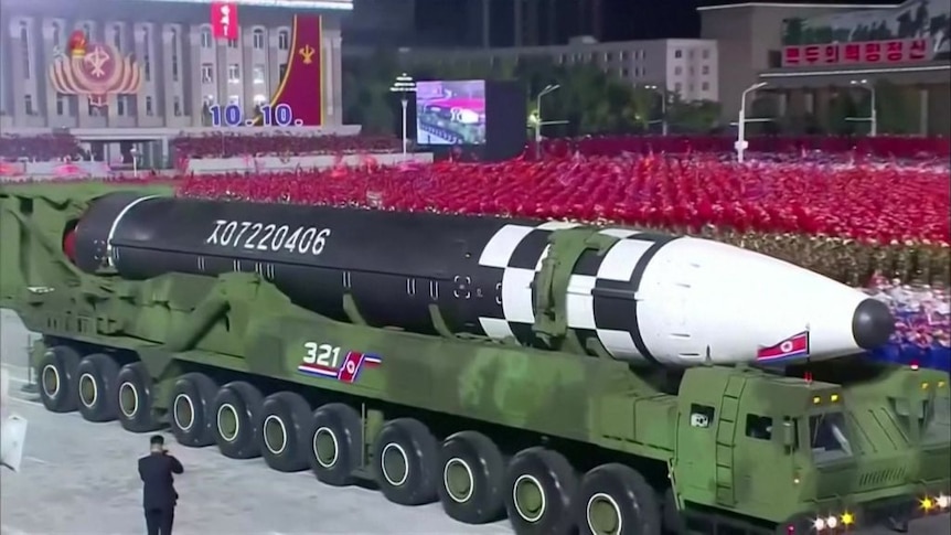 North Korea stages military parade to show off apparent new ICBM