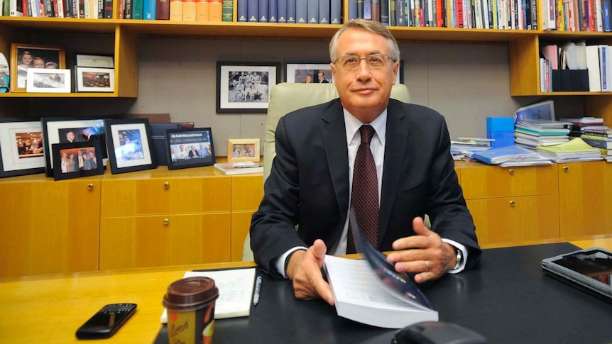Wayne Swan with the 2013 Budget papers
