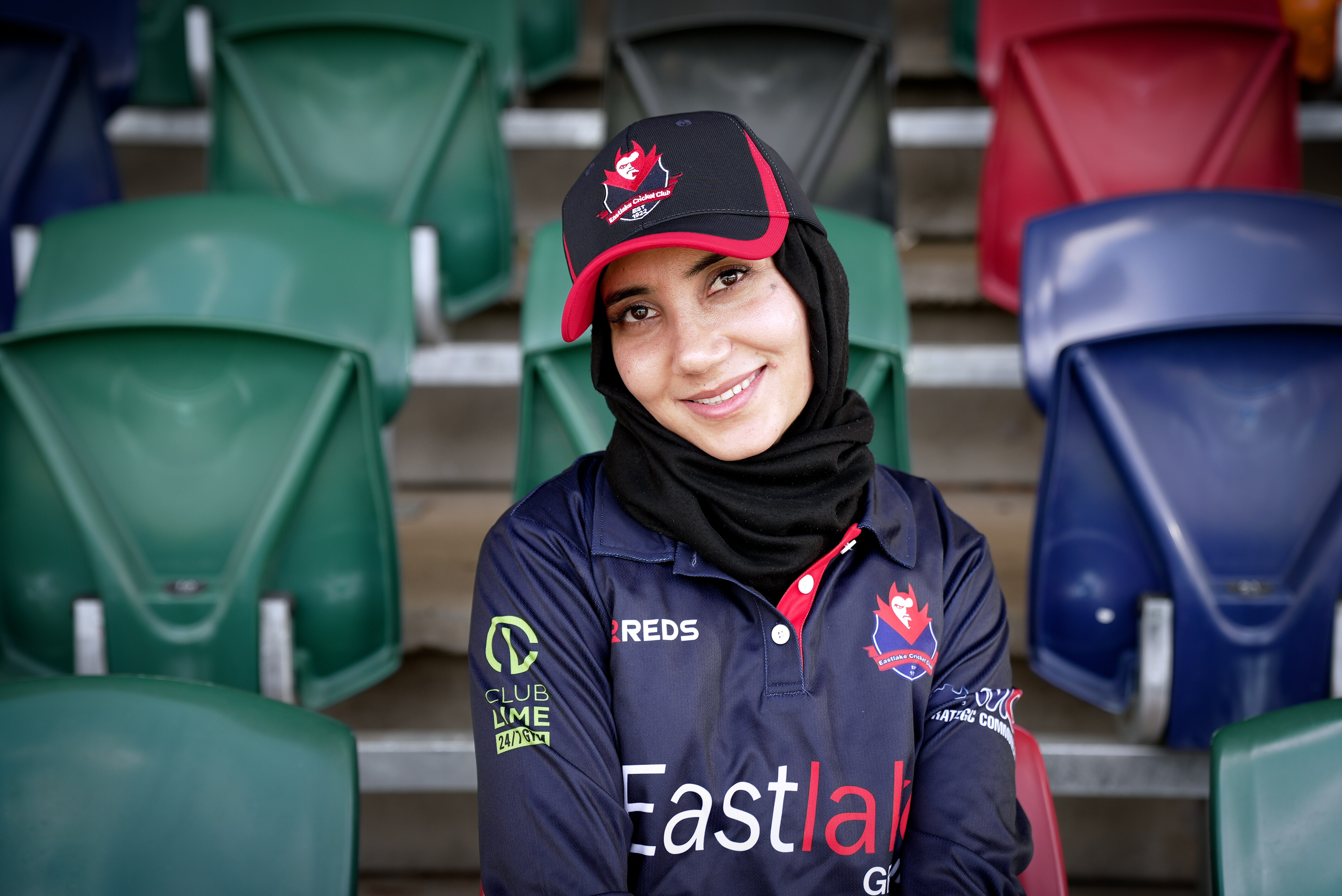 Women in cricket gear train at Manuka oval