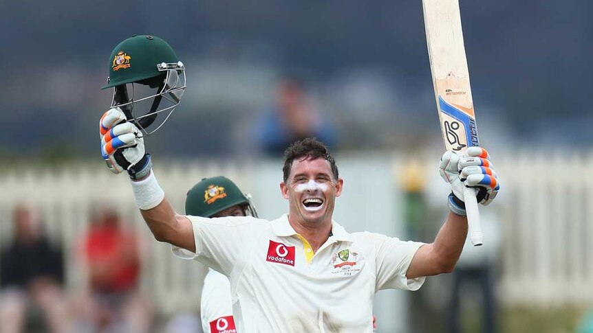 More of the same... Mike Hussey celebrates his 19th Test century.