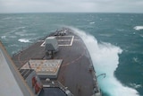 An image of a US warship at sea.