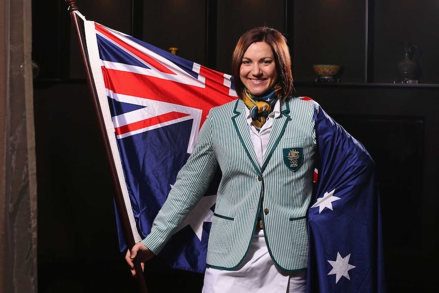Anna Meares poses with the Australian flag