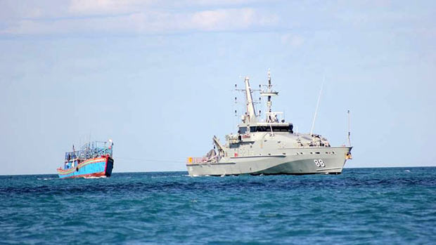 An asylum seeker boat being towed out of Broome in July 2013.