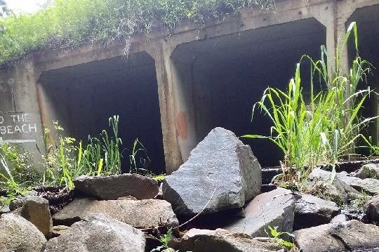 A bridge with rocks.