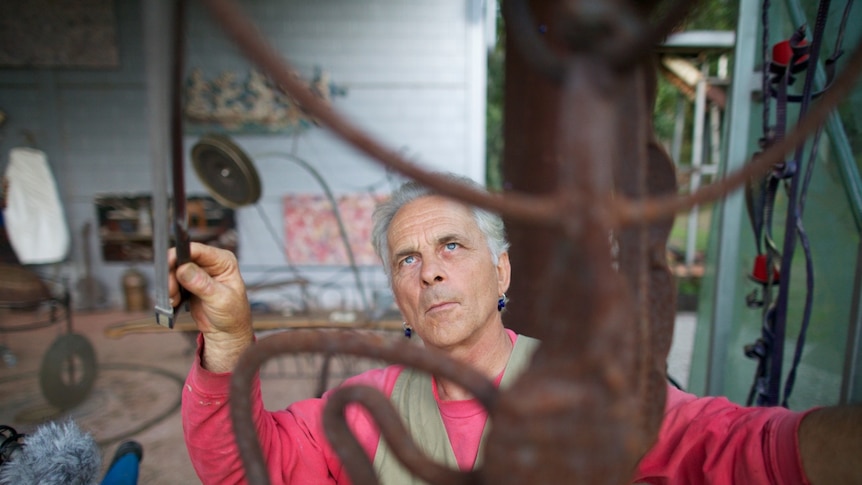 bowing the metal sculpture to create resonances