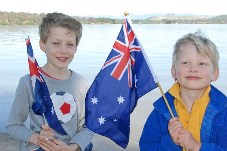 Boys with flags to see the Queen