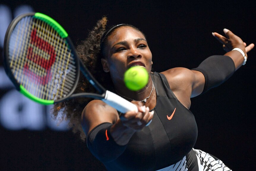Serena Williams stretches for a forehand