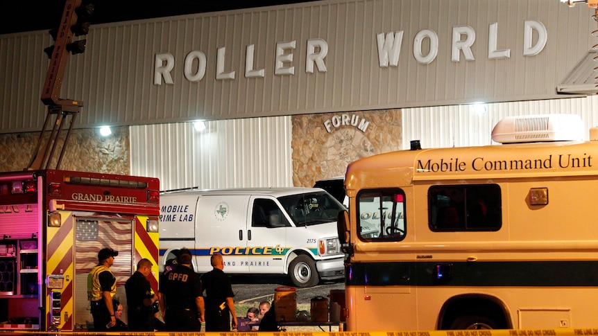 Police outside Roller World Forum in Texas