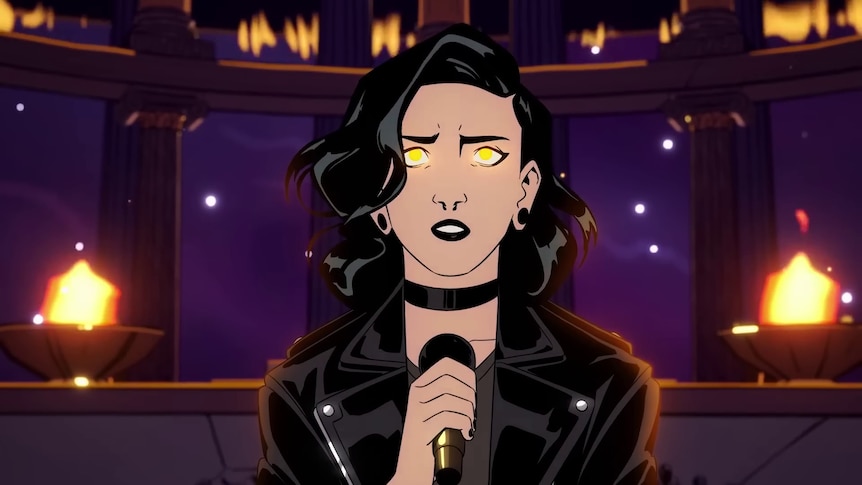 Art from Stray Gods, depicting a young woman singing into a mic while her eyes glow, against a backdrop of flames