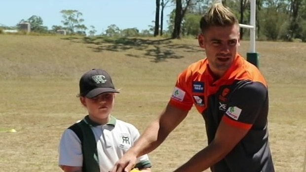 Coniglio conducting an AFL training clinic