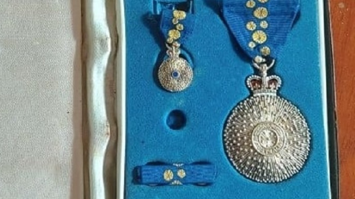 Order of Australia medals found in tin box lying in Gold Coast gutter