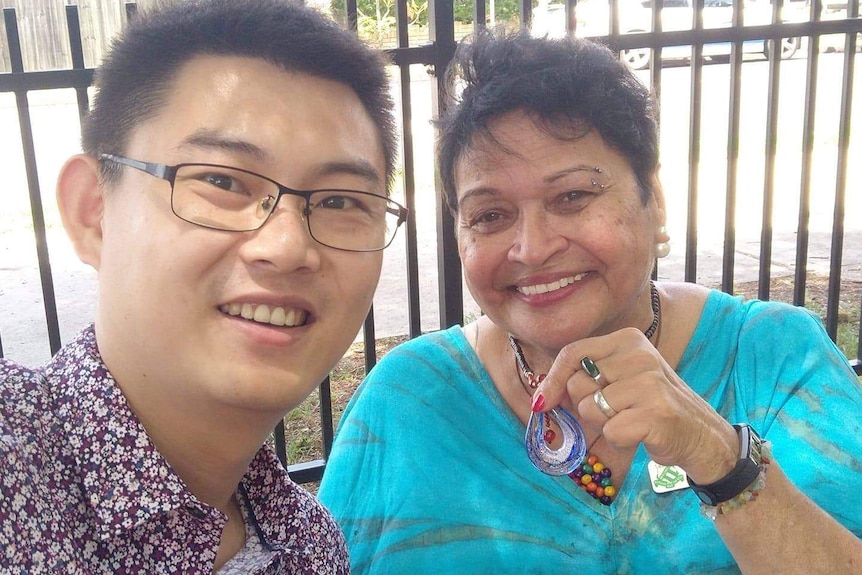 Brisbane resident Xianyang Tang and Brenda Kanofski taking a picture together.